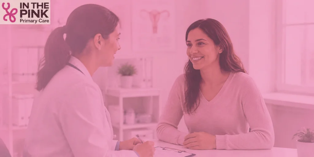 Woman discussing her health concerns with a primary care doctor during an annual wellness exam in McKinney, TX